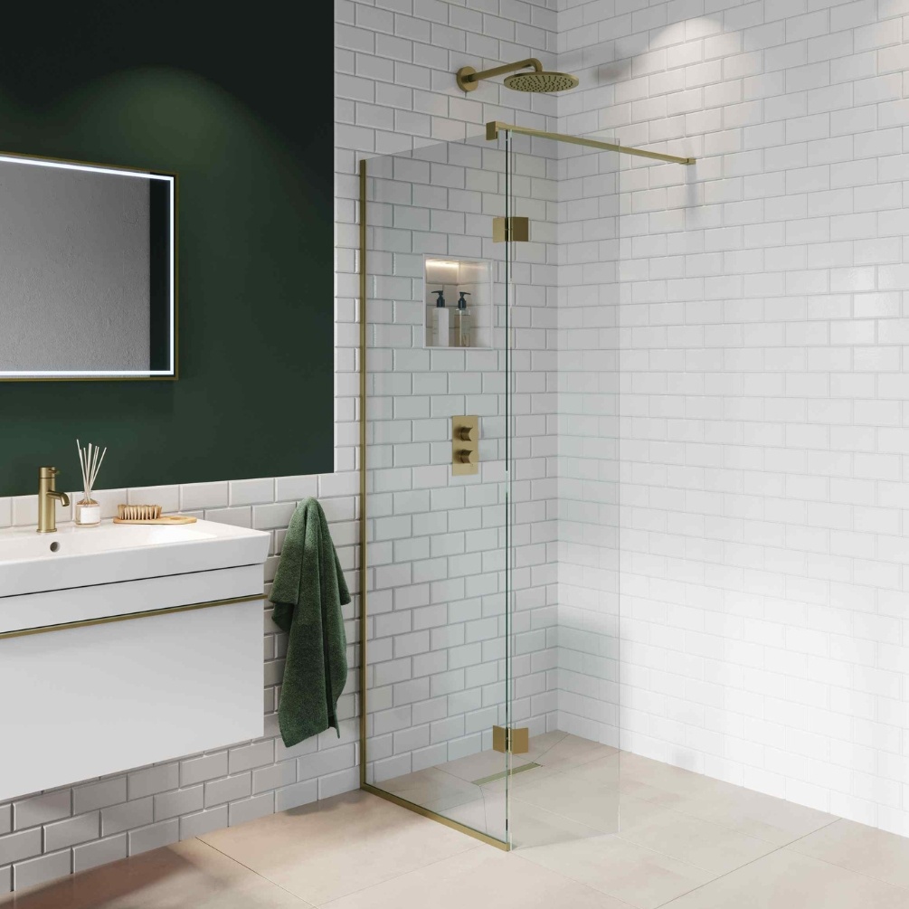 Lifestyle image of the Abacus Brushed Brass 700mm Wetroom Screen with Wall Support Bar & Deflector Panel